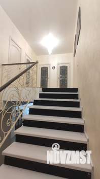 Коттедж 300м², 3-этажный, участок 7 сот.