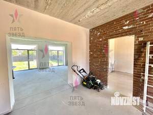 Коттедж 295м², 3-этажный, участок 6 сот.  