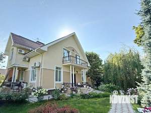 Коттедж 297м², 2-этажный, участок 10 сот.  